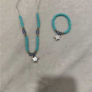 Teal star necklace